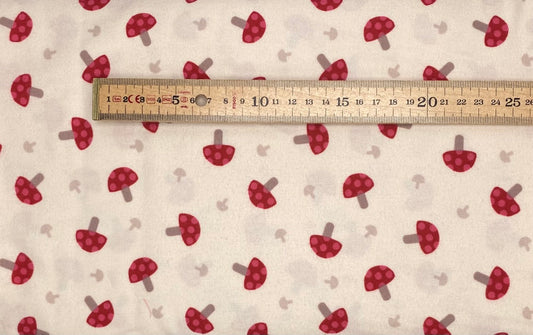 Red toadstools on cream - Flannel