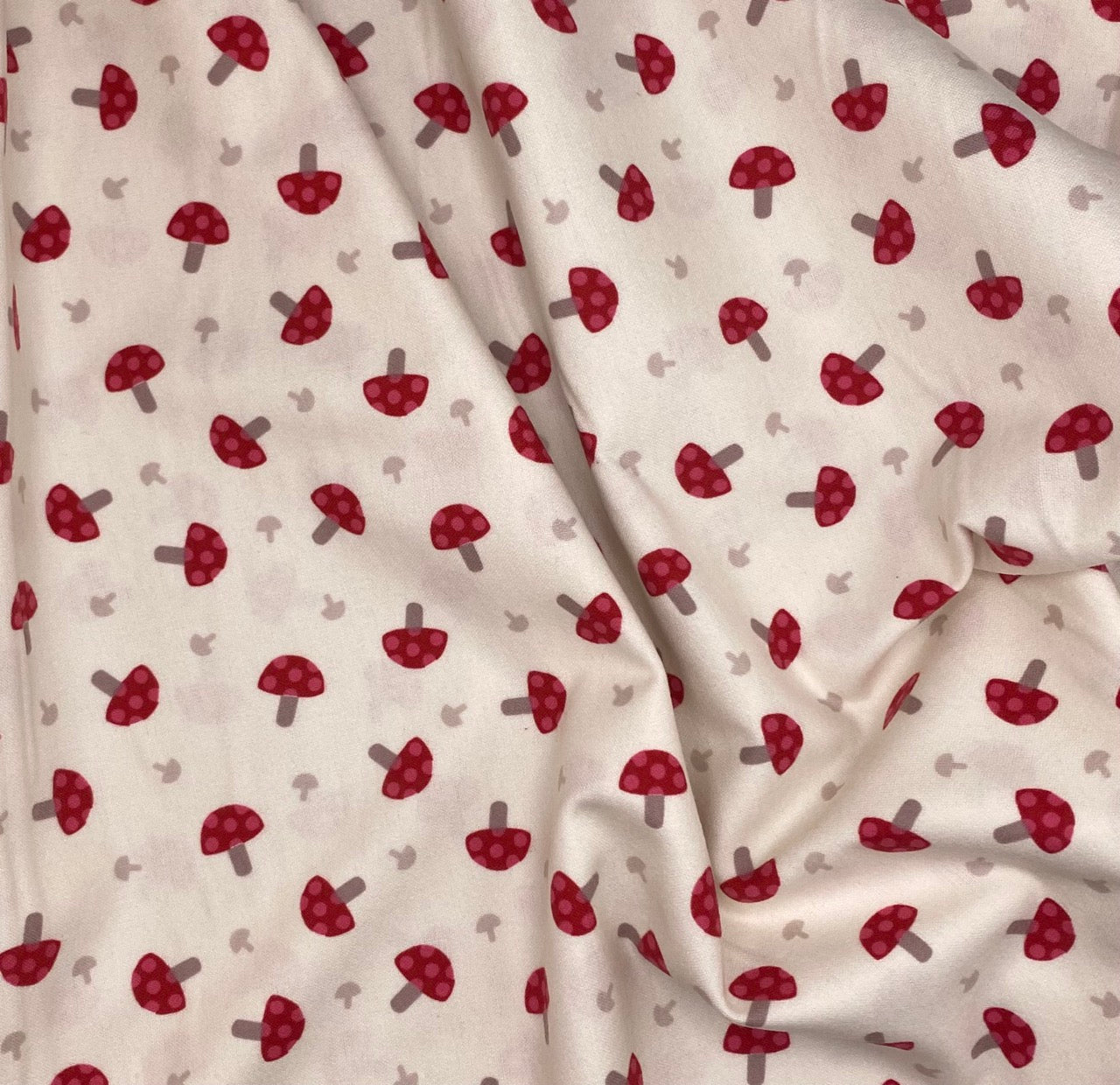 Red toadstools on cream - Flannel