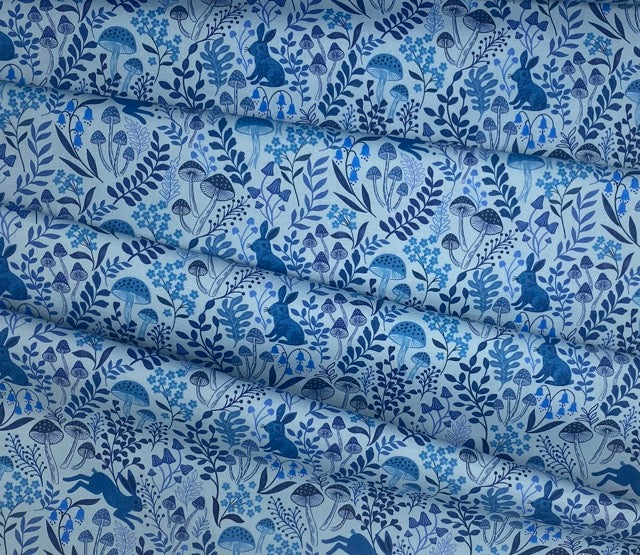 Rabbit meadow on eggshell blue