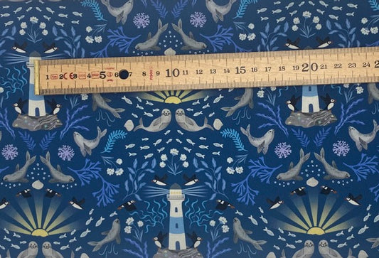 Puffin rock lighthouse on dark blue