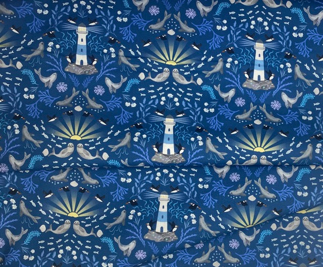 Puffin rock lighthouse on dark blue