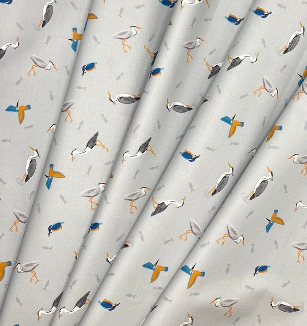 Herons and kingfisher on light blue