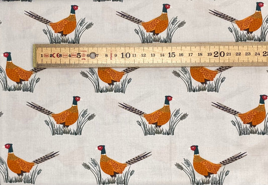 Pheasants on dark cream