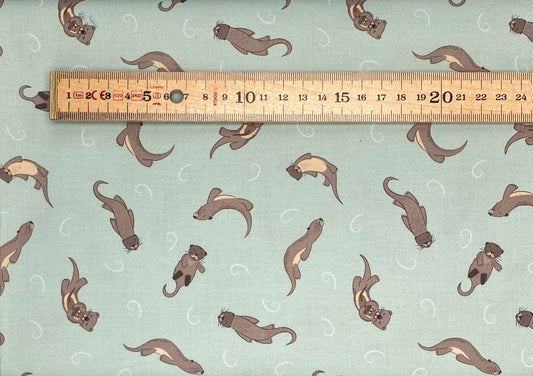 Otters on muted blue