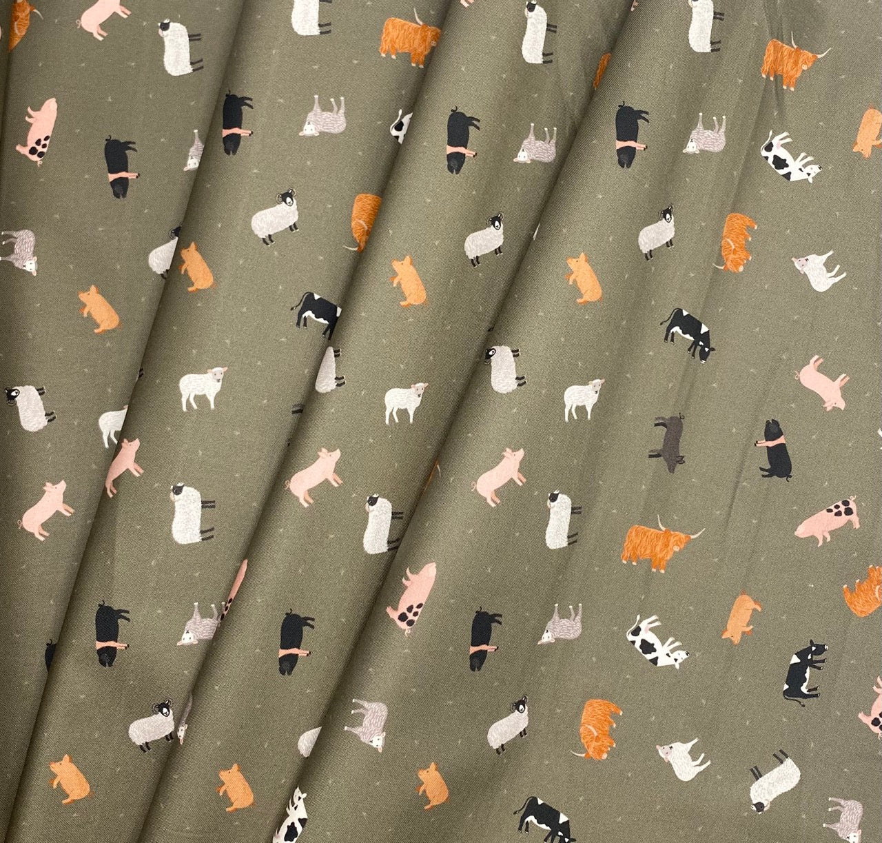 Farm animals on country green