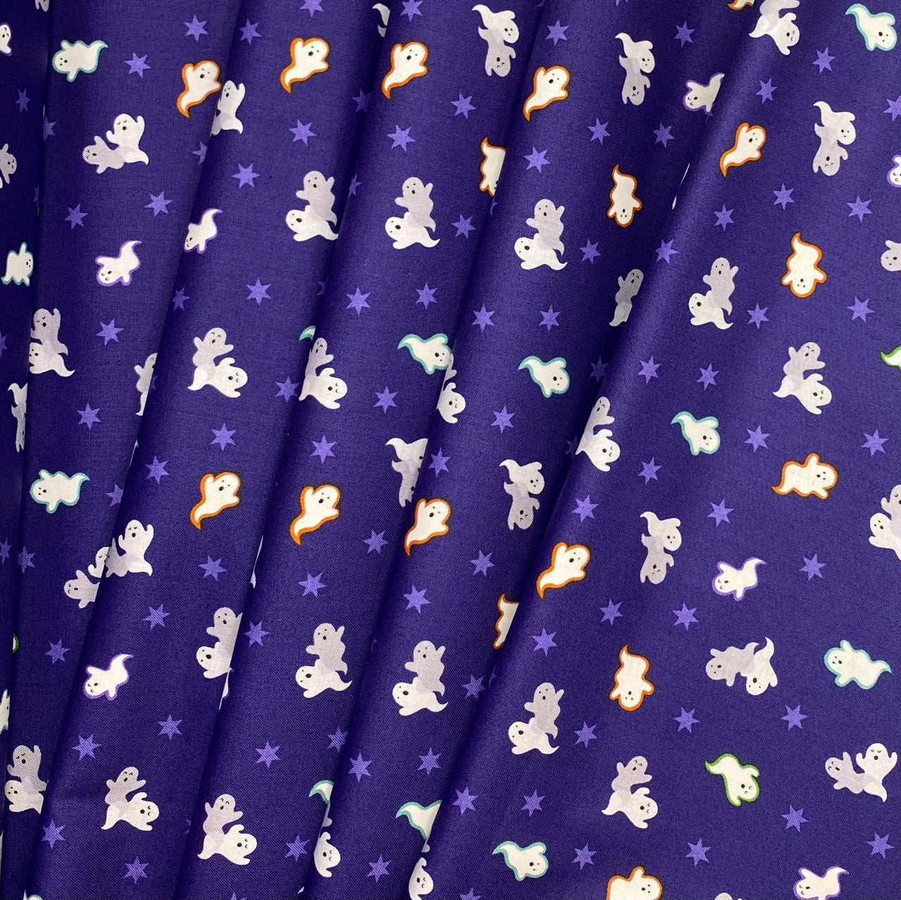 Spooky ghosts on blue