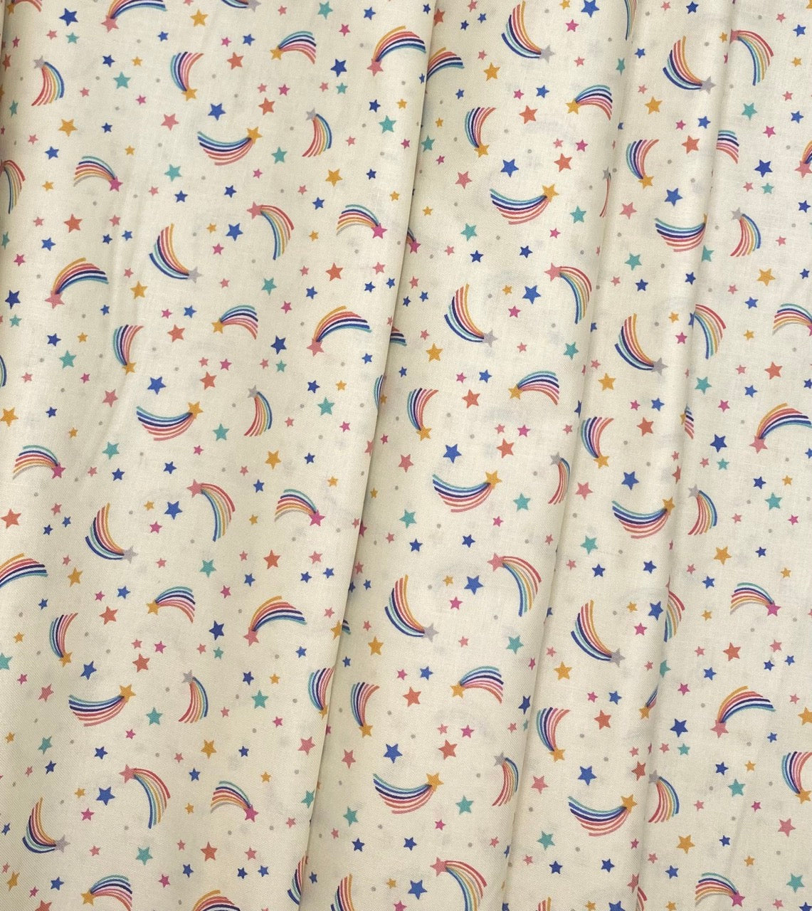 Shooting rainbow stars on cream