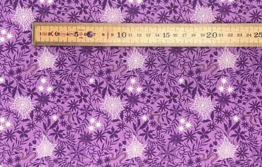 Floral cobwebs on light purple