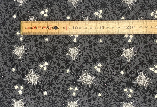 Floral cobwebs on grey