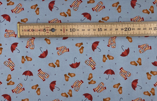 Brollies and scarves on light blue