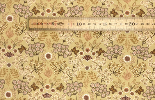 Large floral butterfly on warm gold