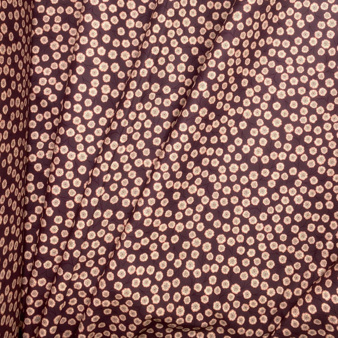 Simple flower on dark aubergine