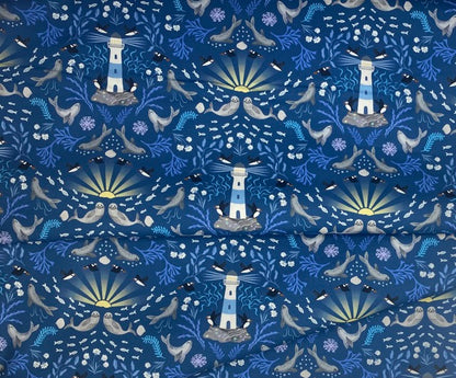 Puffin rock lighthouse on dark blue