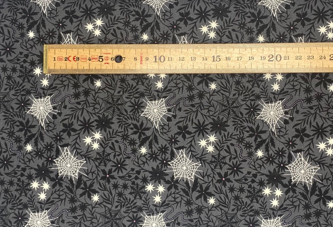 Floral cobwebs on grey