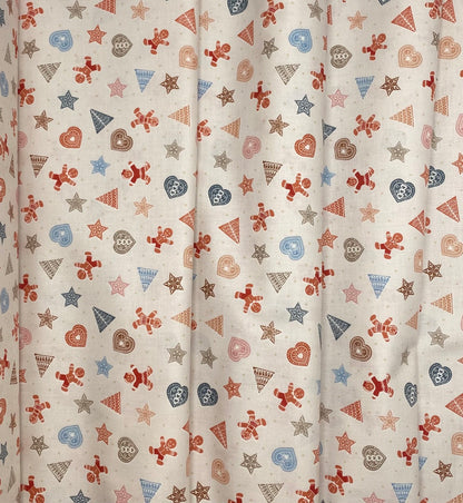 Gingerbread shapes on cream