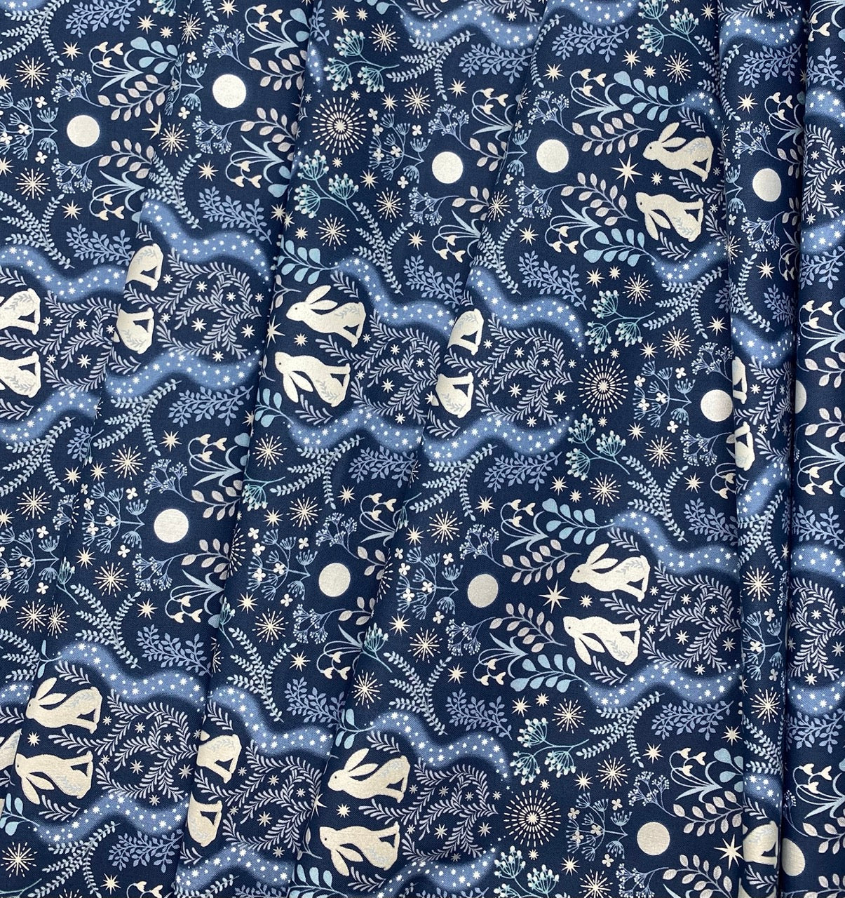 Winter hare on midnight blue with pearl