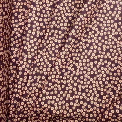 Simple flower on dark aubergine