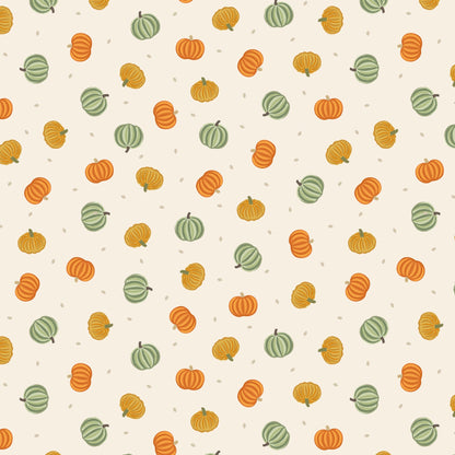 Pumpkins on cream