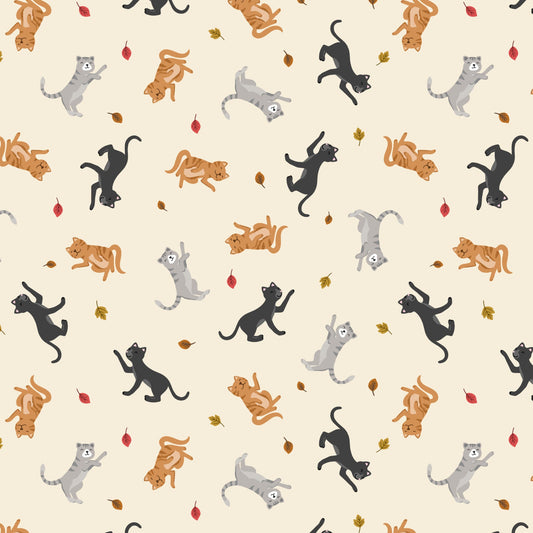 Cats and falling leaves on cream
